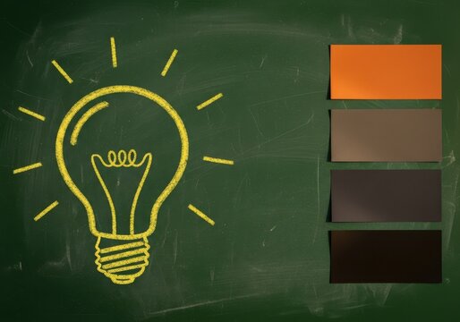 Idea lightbulb drawn with yellow chalk on green chalkboard with colorful blank note papers, glowing bulb sketch for creative thinking, brainstorm, and innovation background
