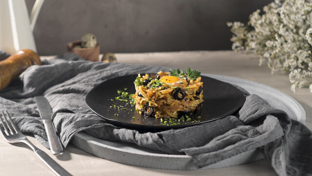 Traditional Portuguese codfish with shredded potatoes, eggs, and olives