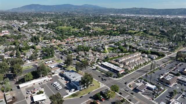Afternoon aerial view of the downtown commercial district and surrounding neighborhood of Yorba Linda, California, USA.