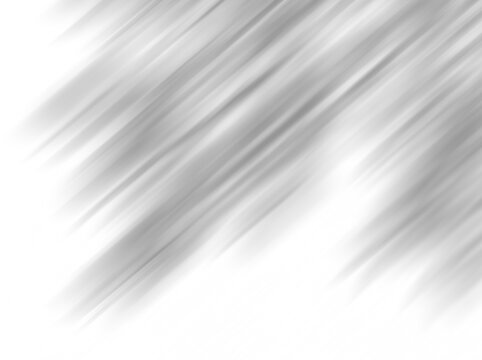 Abstract diagonal light streaks. Soft grey motion blur background with white copy space.