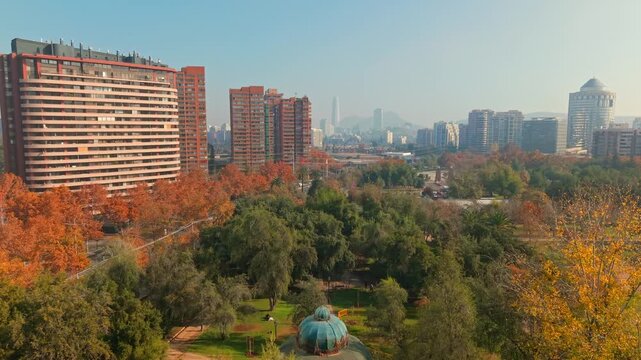 Panoramic aerial view of the aviary surrounded by trees in Araucano Park in Las Condes, Santiago, Chile