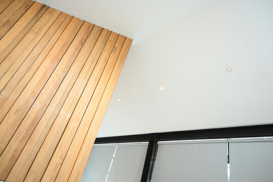 modern architecture background with black steel frame and wooden slat wall