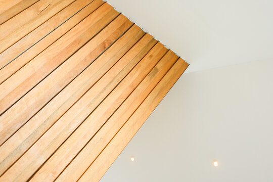 light brown wooden wall with natural wood grain texture
