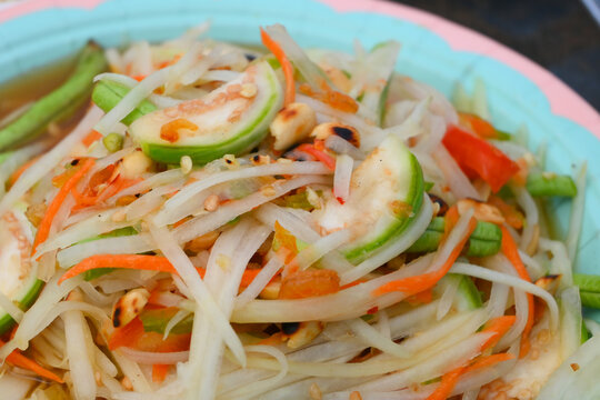 Thai green papaya salad serve in bowl, Thai cusine and healthy eating