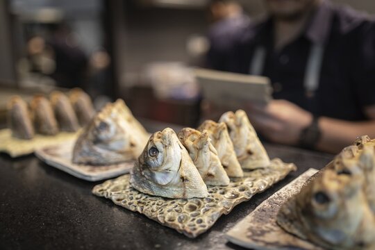 Pacu heads, preparation in the kitchen, Restaurante El Central, Lima, Peru