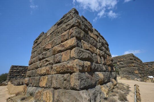 Detailed view of a corner of an ancient ruined wall in an arid landscape under a clear blue sky, Palaiokastro, Ancient Fortress, 3rd and 4th century BC, above Mandraki, Nisyros, Dodecanese, Greek Islands, Greece