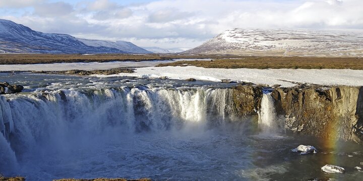Godafoss with rainbow, snow, winter, tourimus, attraction, Iceland