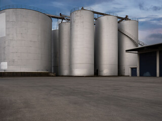 Car background, automotive backplate, industrial storage silos for oil, fuel, grain. © Chris