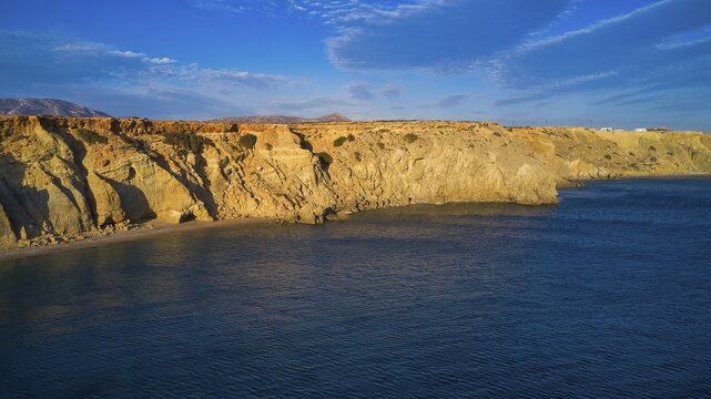 View of the wide sea with rocky coast and blue sky, drone shot, evening light, Paralia Agios Theodoros, Agios Theodoros Beach, south-west coast, Karpathos, Dodecanese, Greek Islands, Greece