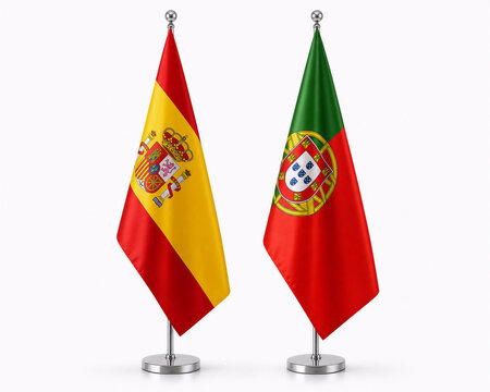 Two national flags, Spain and Portugal, mounted on silver bases, displayed side by side against a plain background, representing their countries.