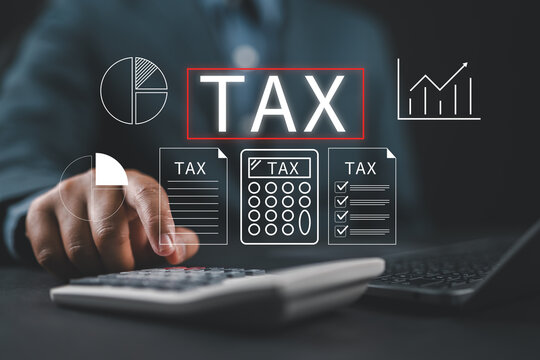 Tax calculation financial accounting and business management strategy. Businessman pressing calculator and writing on document for budget planning and audit.