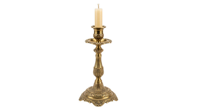 Antique brass candlestick holder with tall white candle isolated on white background macro cutout
