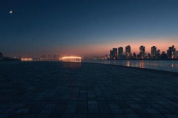 Fototapeta premium City skyline at dusk with illuminated structures reflected on water