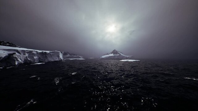 Dark polar seascape under heavy sky, research vessel slicing icy waves toward distant jagged iceberg and mountain, cold mist hovering over reflective water, low
