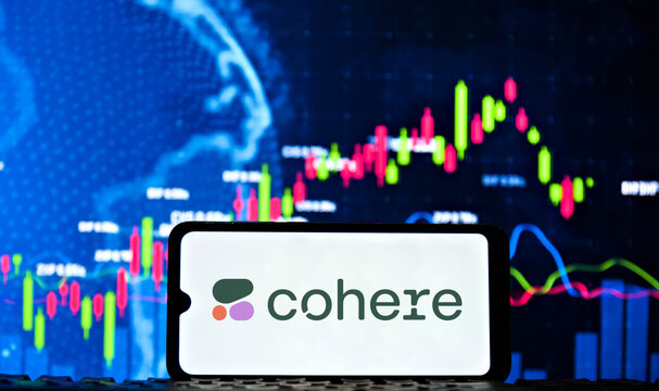 Cohere AI logo displayed on a smartphone screen with financial stock market candlestick charts in the background
