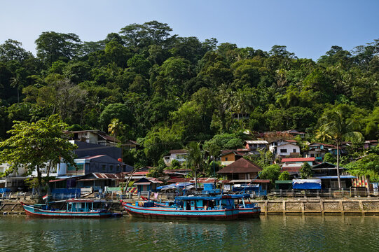 Traditional fishing village on the riverbank in Padang