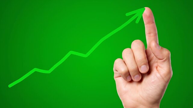 Hand pointing to a green arrow graph on a green background, symbolizing growth
