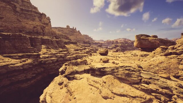 Hiking route across canyon ridge with worn trail, scattered boulders and panoramic vistas, rugged terrain inviting exploration and outdoor adventure