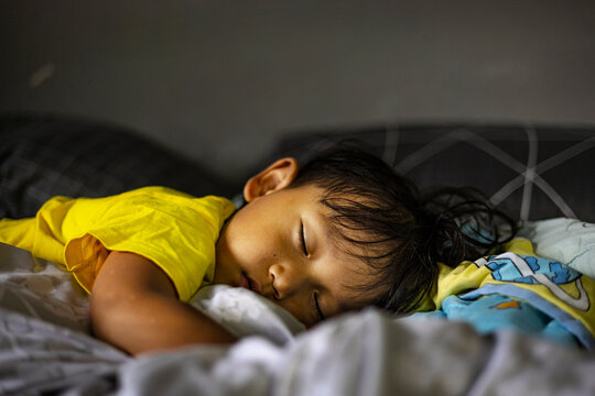Toddler Sleeping Peacefully During Afternoon Nap