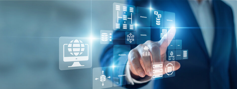Analytics driven insight. Analyst hand touch virtual screen visualizing Big Data sets. Finding hidden trends and making informed choices based on complex information processing.
