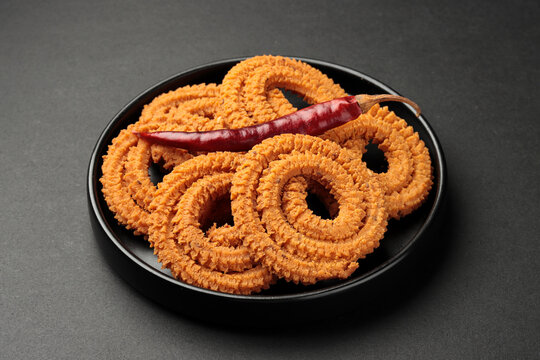 Indian traditional snacks called Chakli eats in Diwali festival