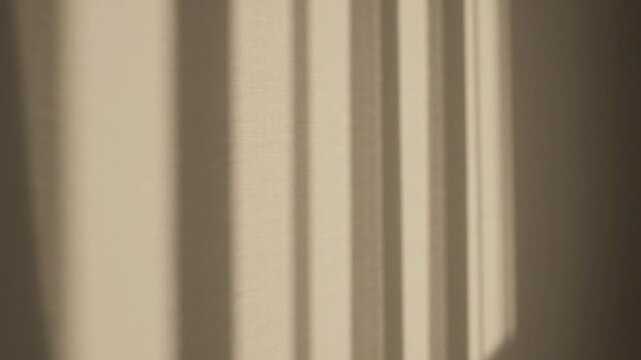 Sunlight and Blind Shadows on Beige Linen Curtains