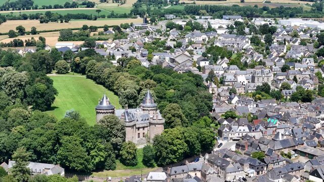 Panning drone aerial right to left Comburgh town centre Brittany France drone aerial