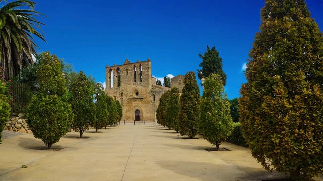 Historic Park G&uuml;ell Architecture in Barcelona Spain with Ancient Stone Structures, Landmark Towers and Gaud&iacute; Monument Under the European SkyHistoric Park G&uuml;ell Architecture in Barcelona Spain with Anc