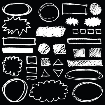 A set of chalk-drawn shapes and abstract elements for creative design. A classroom blackboard for doodling.