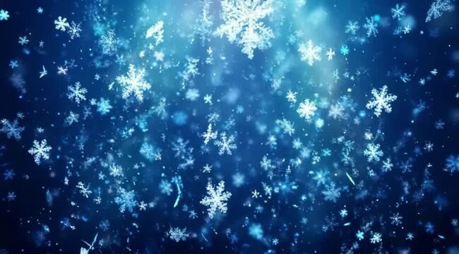 Dazzling winter atmosphere captures a dense flurry of geometric frozen ice crystals descending through the dark night sky to create a magical feeling during the festive holiday season