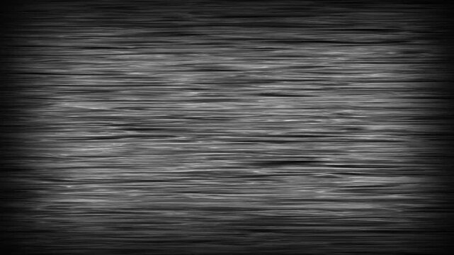 Dark textured wood grain with subtle horizontal movement and vignetting for abstract backgrounds and design.