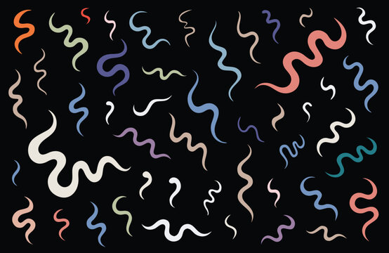 Colorful squirming worms on black background