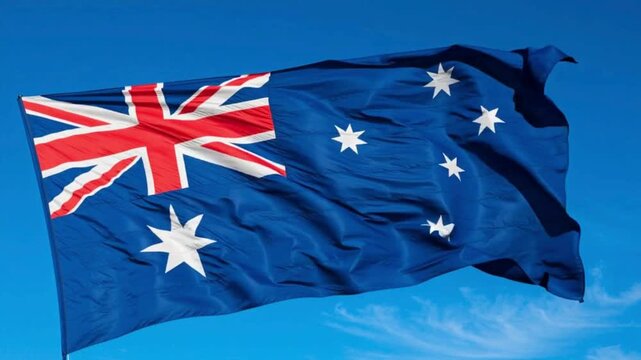 The Australian flag is waving in the sky