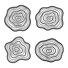 Collection of hand drawn tree ring cross sections in outline style. Vector wood grain design elements. © Alona