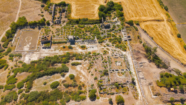 Balat, Turkey. Aerial drone view of the Bouleuterion council house and North Agora market in the ancient city of Miletus. Aerial View