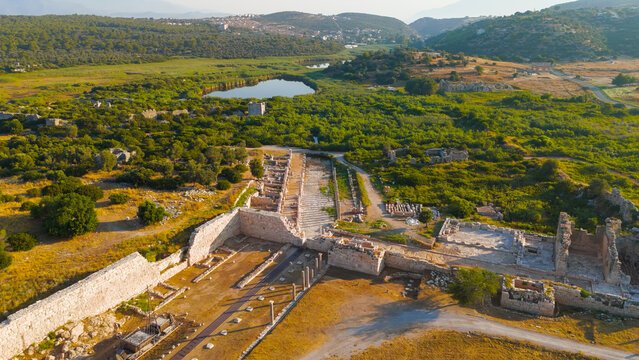 Gelemis, Turkey. Colonnaded Street and Agora in Patara ancient city, main thoroughfare and commercial center of Lycian capital in summer morning. Aerial View