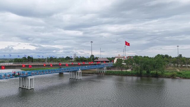 Top-down aerial view of the Hien Luong Bridge crossing the Ben Hai River, showing the bridge structure from directly above with water on both sides.