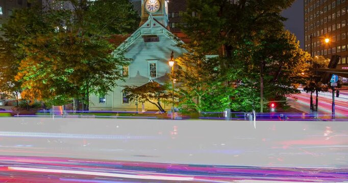 Sapporo Clock Tower Night Timelapse: Historic Wooden Building with Surreal City Street Traffic Long Exposure Blurred Lights, Hokkaido, Japan - 4K Close Shot