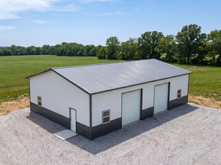 3D Illustration of Open Front Metal Barn Building in Rural Landscape © Vani