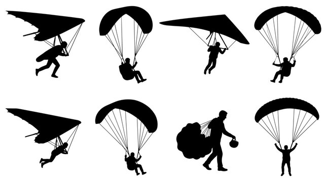 Collection of eight black silhouettes of paragliders and hang gliders in flight, isolated on a white background, representing adventure and freedom