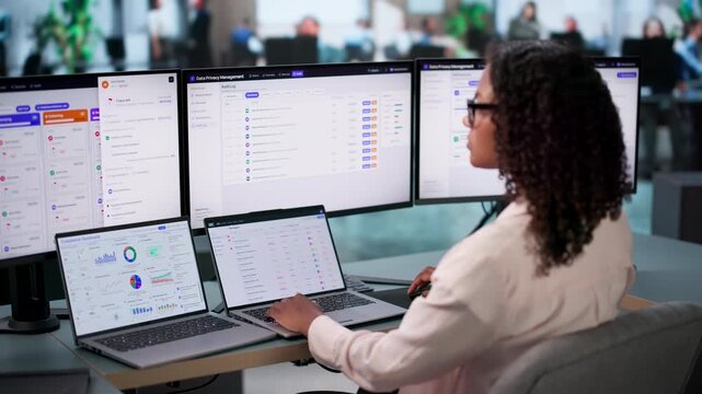 Data Privacy Officer Reviewing Compliance Reports On Desktop