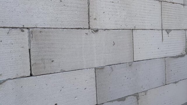 Concrete block wall texture background close up