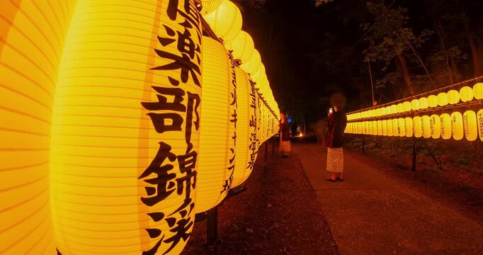 Japanese Shrine Lantern Festival Night Timelapse: Illuminated Paper Lanterns and Torii Gate, Sapporo, Hokkaido, Japan - Wide Angle Shot