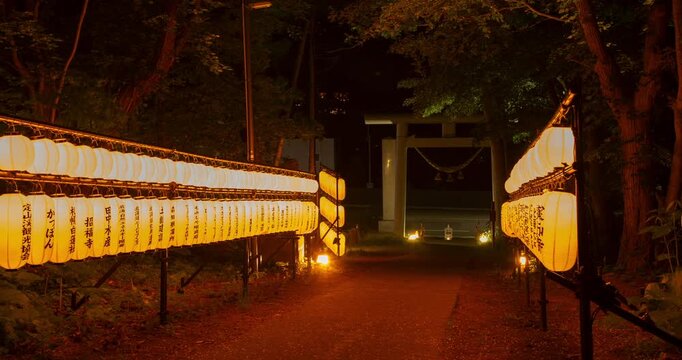 Japanese Shrine Lantern Festival Night Timelapse: Illuminated Paper Lanterns and Torii Gate, Sapporo, Hokkaido, Japan - Wide Angle Shot
