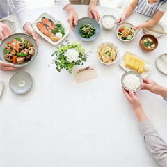 三世代家族が和食を並べて敬老の日の食卓を準備する手元