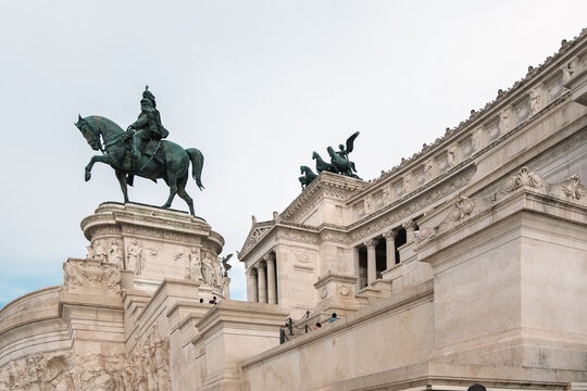 The massive bronze equestrian statue of Vittorio Emanuele II and the marble facade with a quadriga sculpture at Altare della Patria in Rome Italy