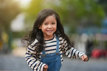 cheerful preschool child girl running in park © geargodz