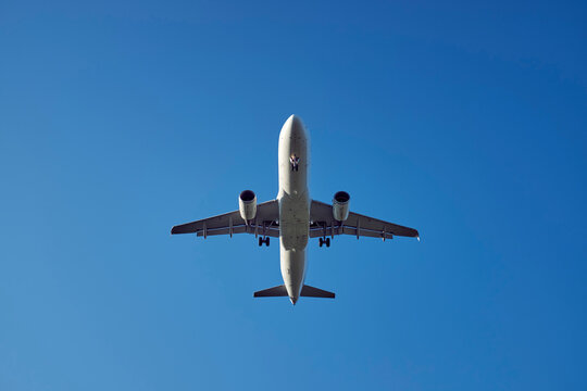 Passenger plane during landing, upward view