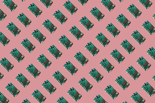 3D Illustration, row of motherboards, pink background