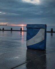 Fototapeta premium Solitary bag by the serene pier with calm wellness styling and soothing natural light